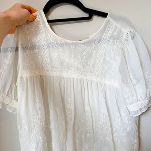 This is a ZARA casual white silk top